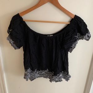 Off the shoulder black flower embroidered crop top
